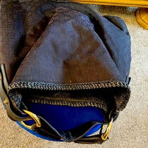 Retro Large Gucci Hobo Bag has some wear.